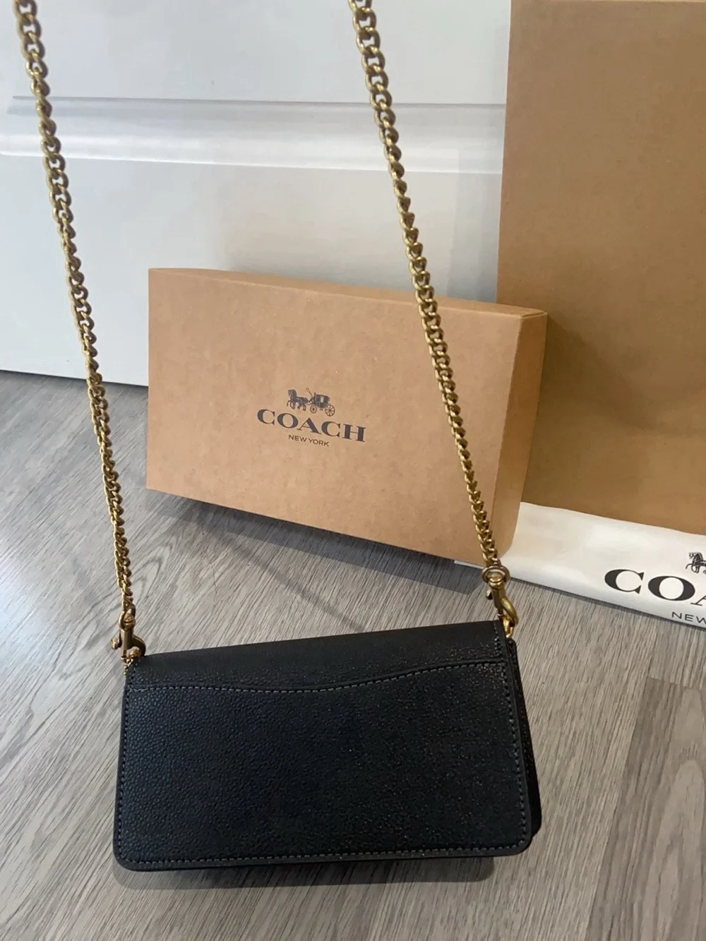 Coach Black Leather Crossbody with Gold 'C' Hardware and Chain Strap